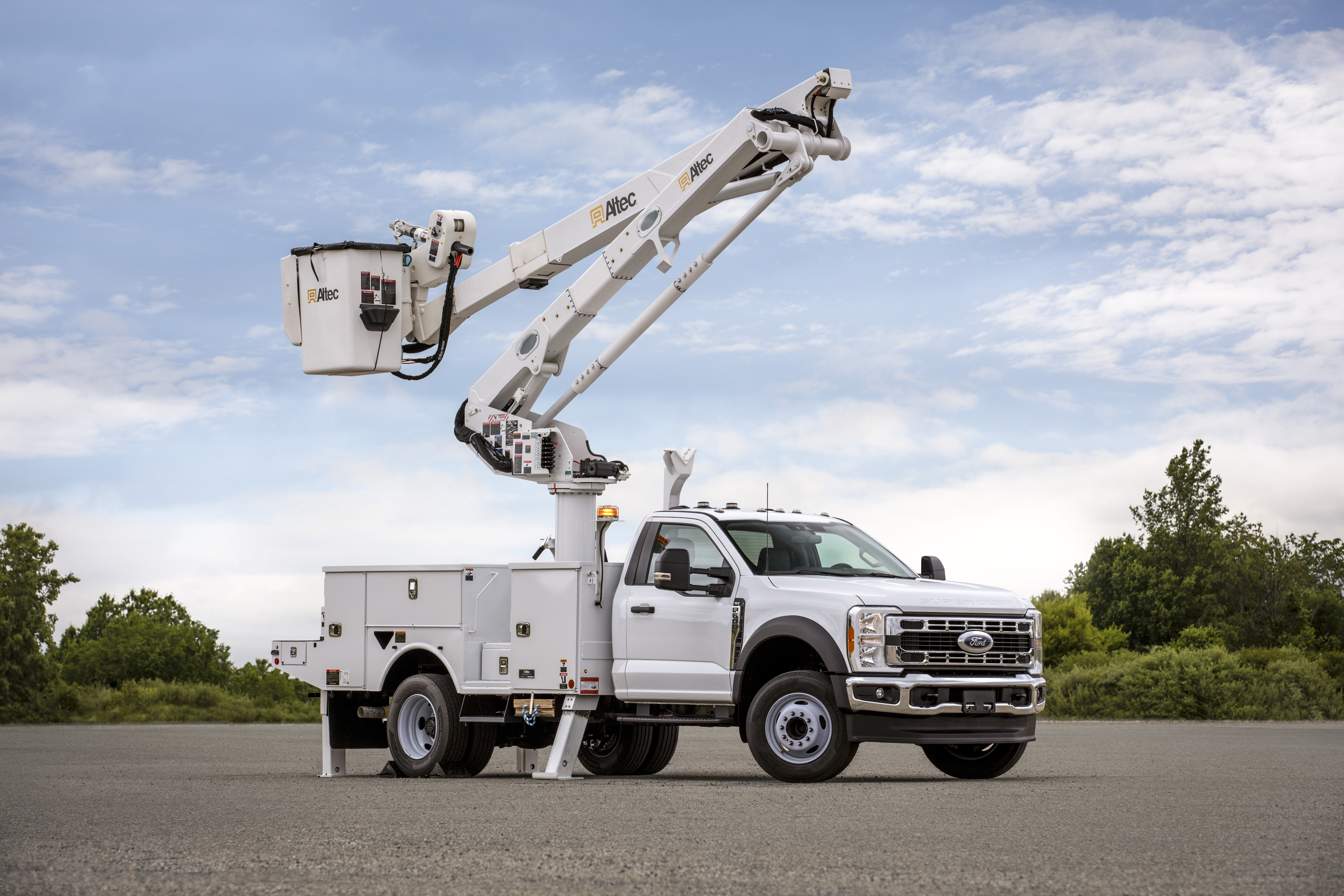 An upfitted 2025 F-600 Super Duty® Chassis Cab with a crane.